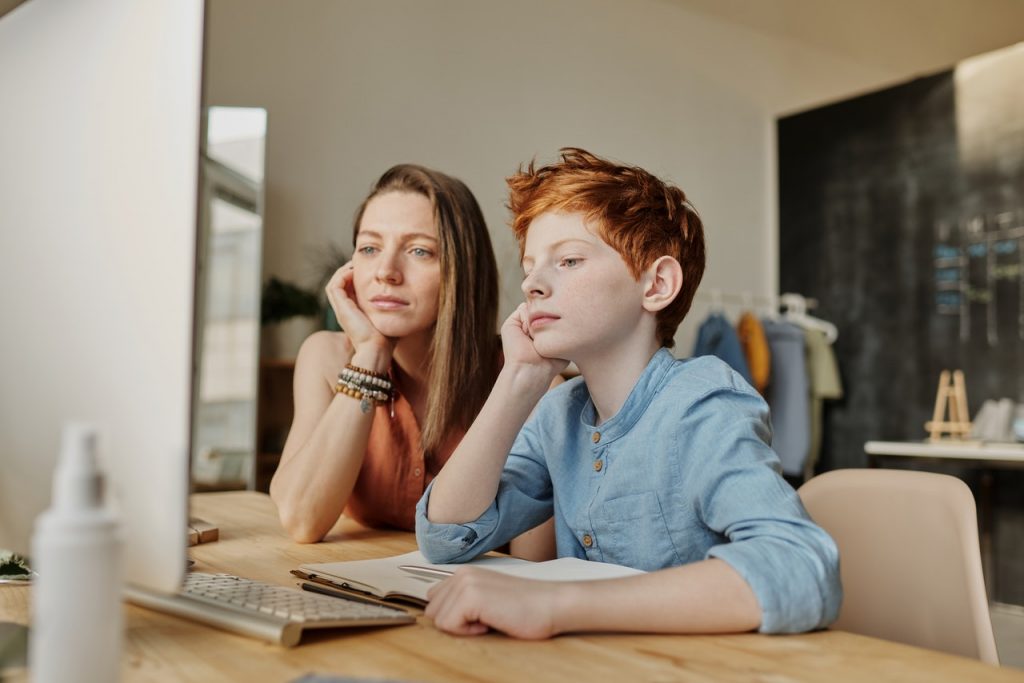 Child using Safari Web Browser with a Parent